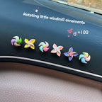 Creative decorations for the new small windmill rotating top in the car