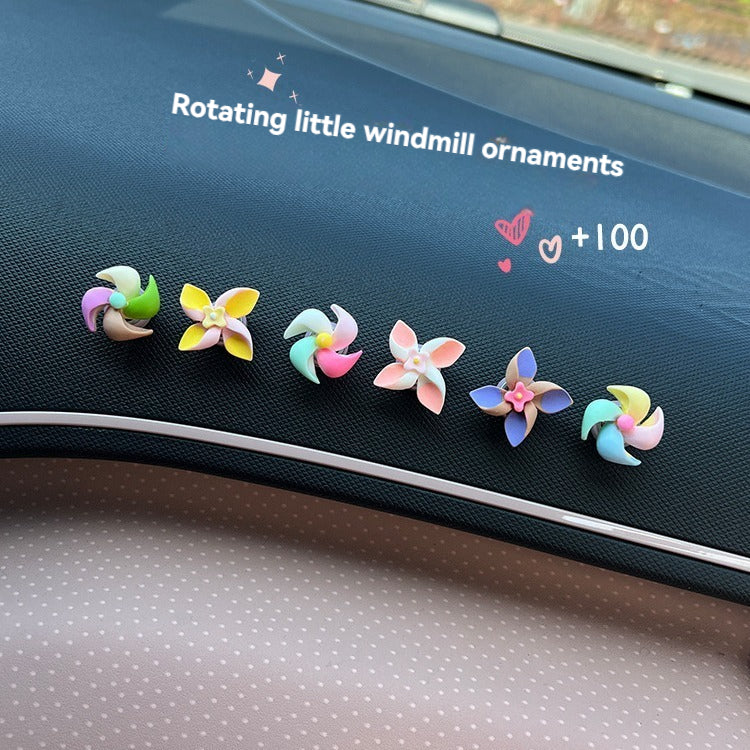Creative decorations for the new small windmill rotating top in the car