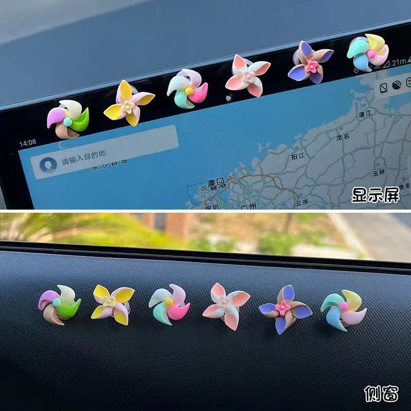 Creative decorations for the new small windmill rotating top in the car