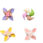 Creative decorations for the new small windmill rotating top in the car